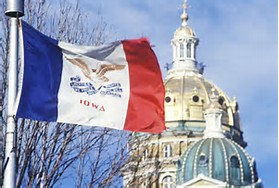 iowa flag over capitol building